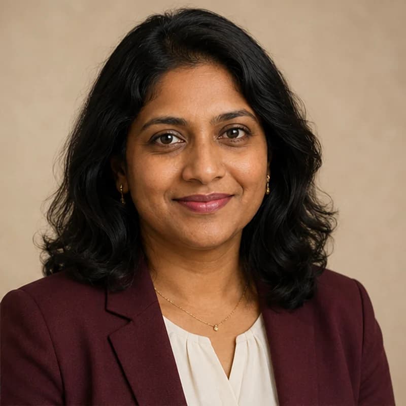 Dr Priya Krishnan, Cambridge PhD · IB Mathematics