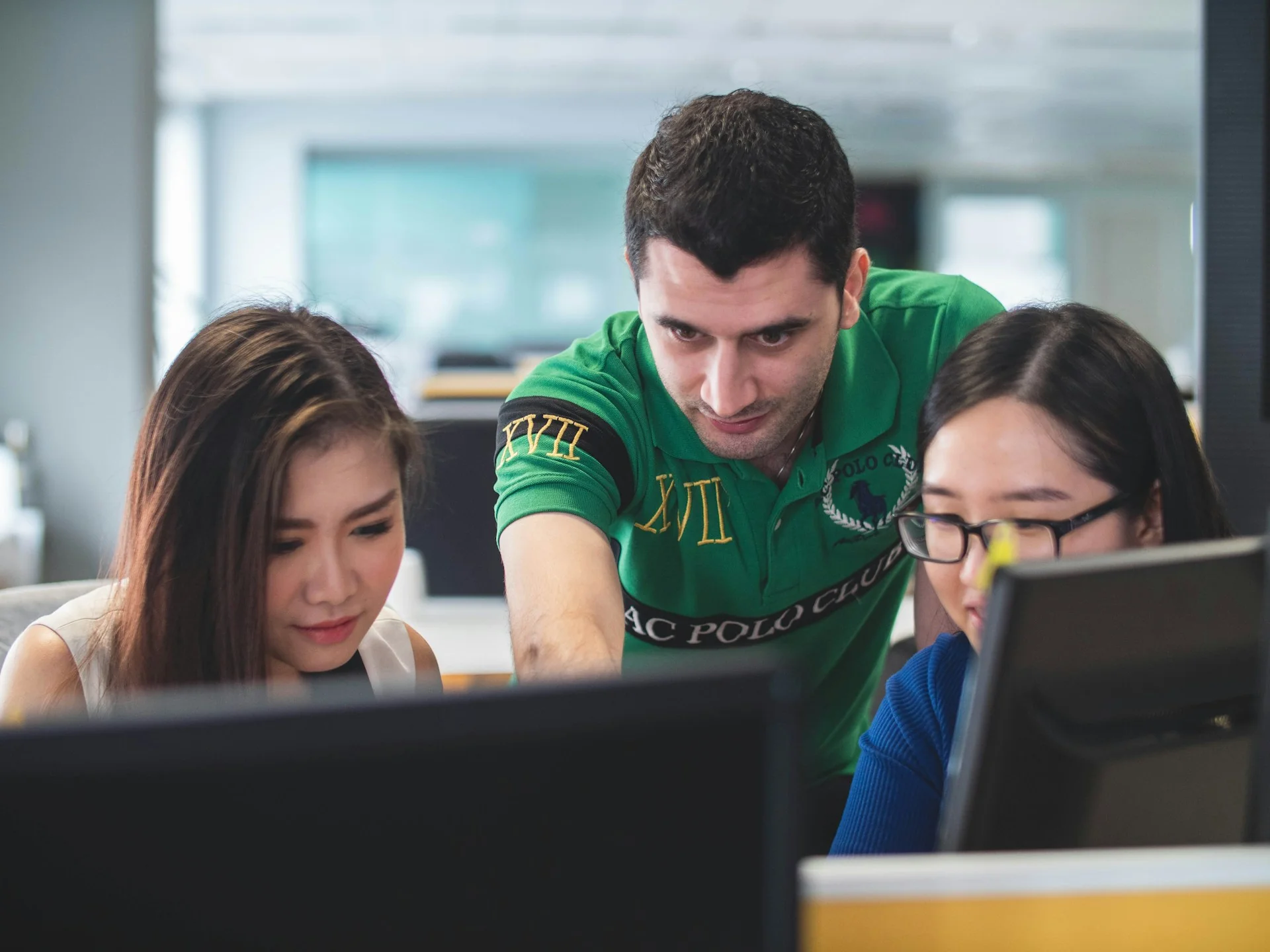 Students discussing A-Level subject choices and university plans in a modern classroom